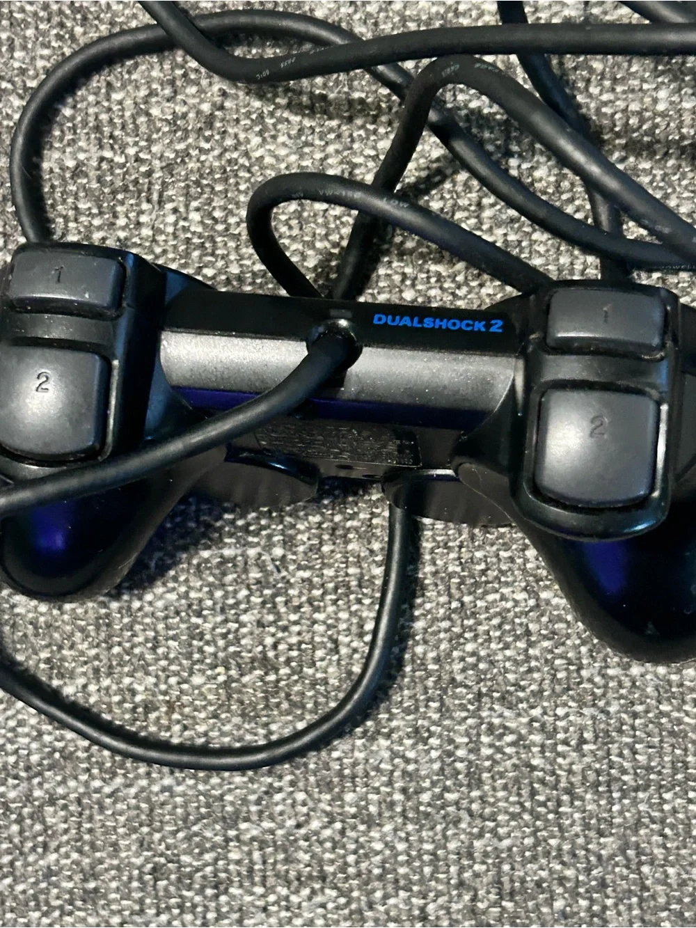 Sony Black Wired PlayStation Controller with Classic Button Icons